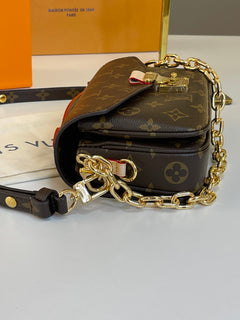 Pochette Metis East West Monogram